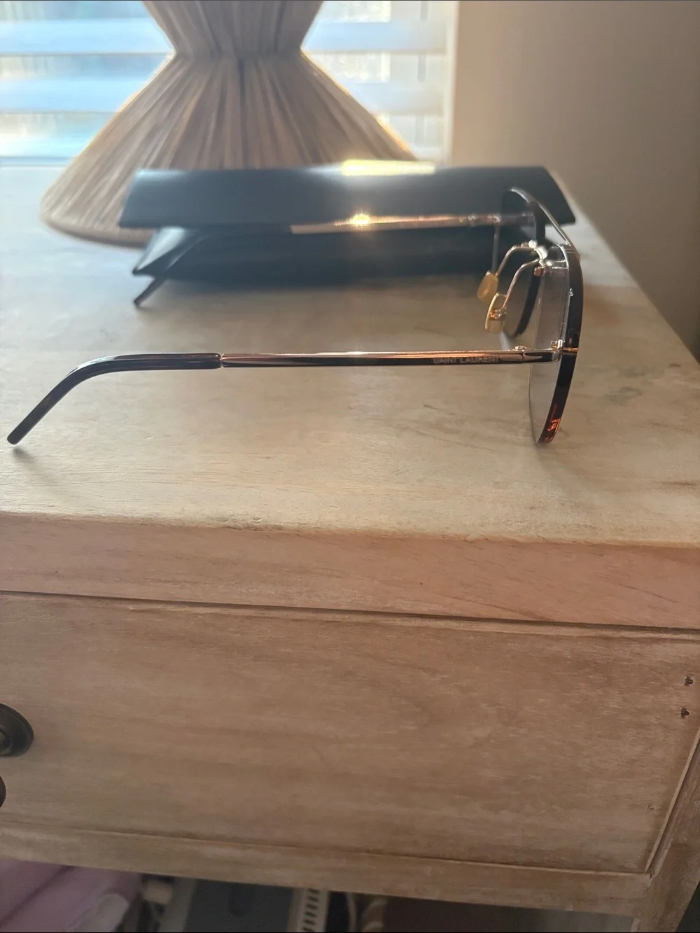 Saint Laurent Rimless women’s Sunglasses with Brown Lenses and Black Case